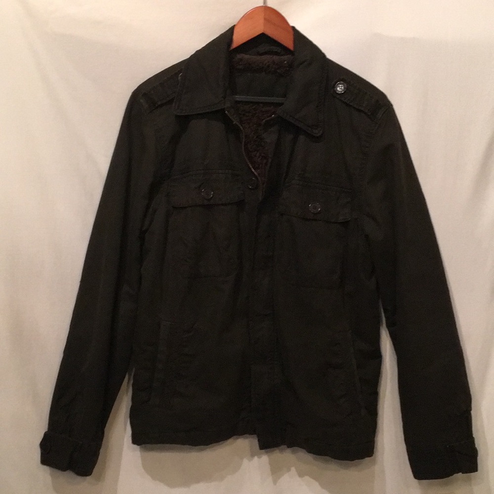 Brown cotton jacket with faux shearling lining. NWOT  never worn .